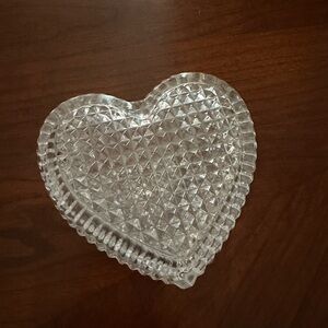 Small glass heart shaped jewelry holder.